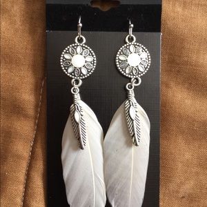 Real feather earrings, new